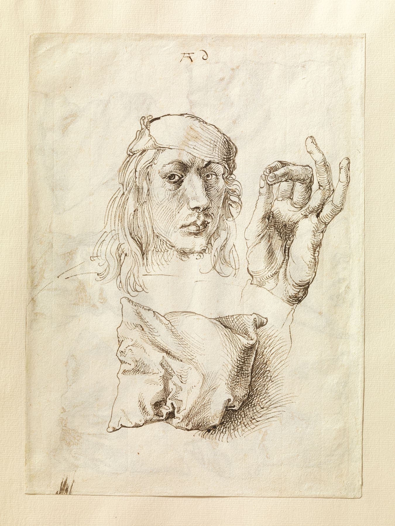 Self-portrait, study of a hand and a pillow